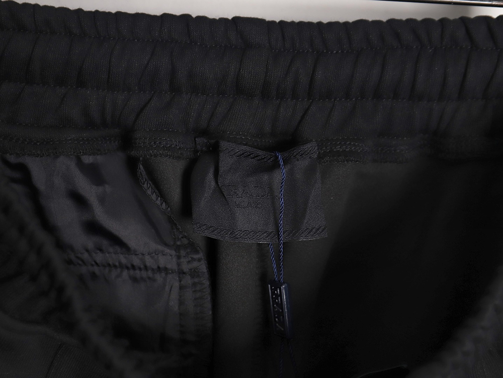 Prada triangle logo side pocket anklets