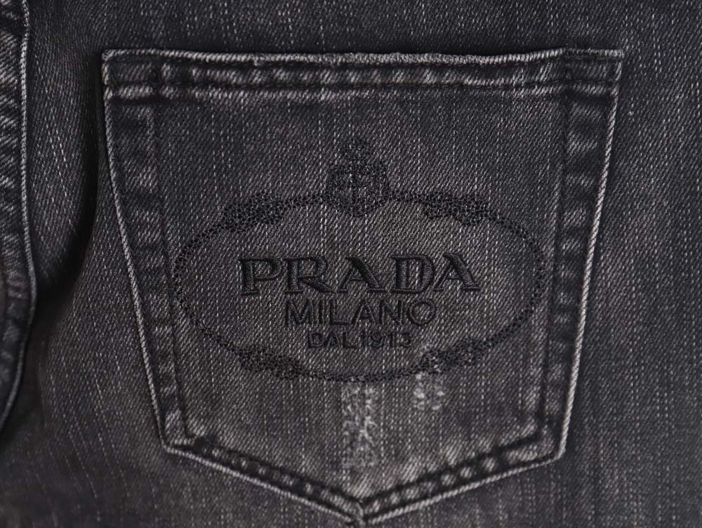 Prada 23Fw triangle logo and logo embroidered washed jeans