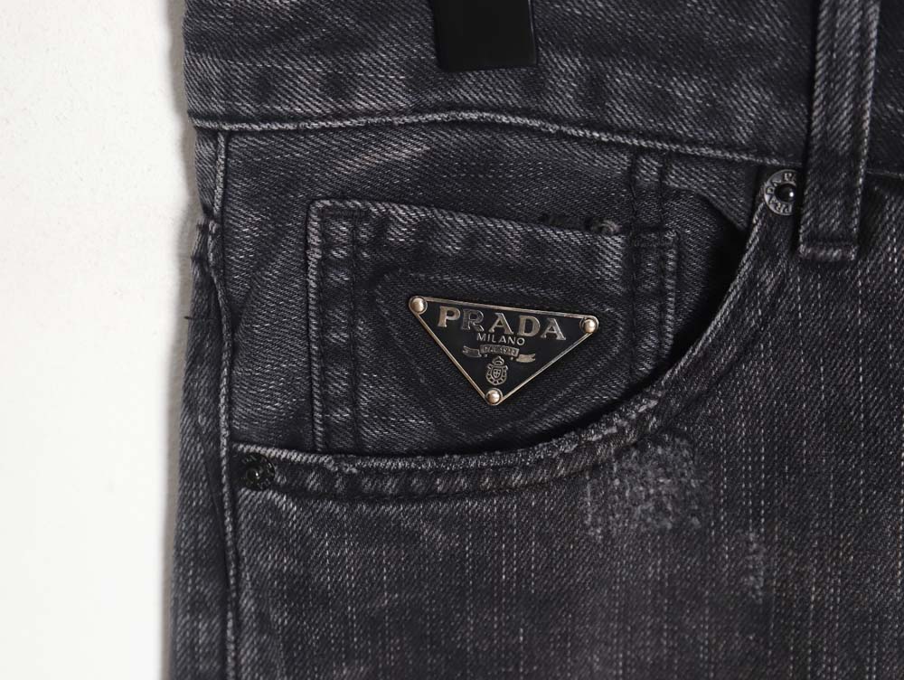 Prada 23Fw triangle logo and logo embroidered washed jeans