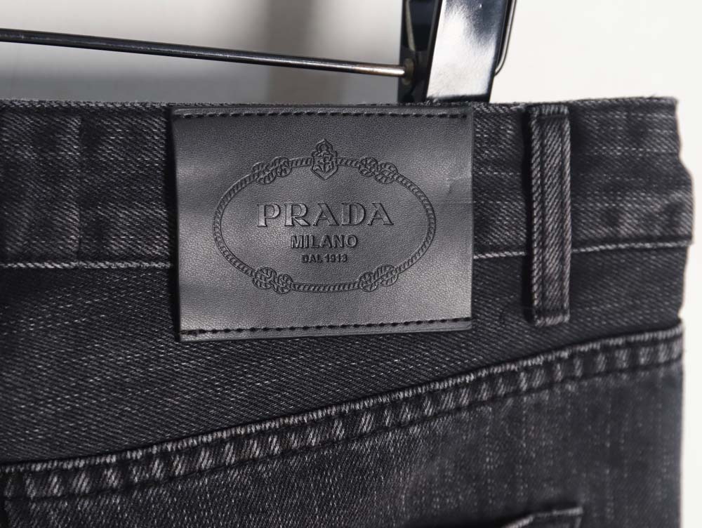 Prada 23Fw triangle logo and logo embroidered washed jeans