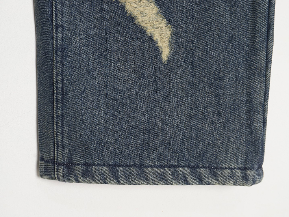 Balenciaga Double B embossed lightning wash distressed jeans