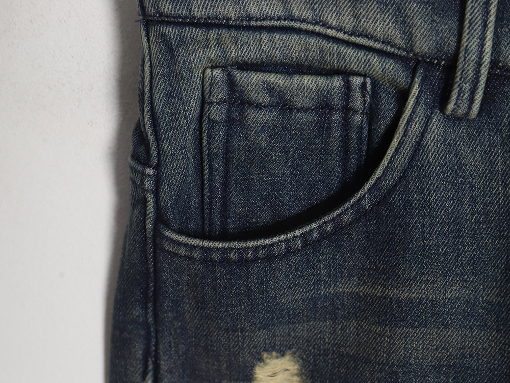 Balenciaga Double B embossed lightning wash distressed jeans