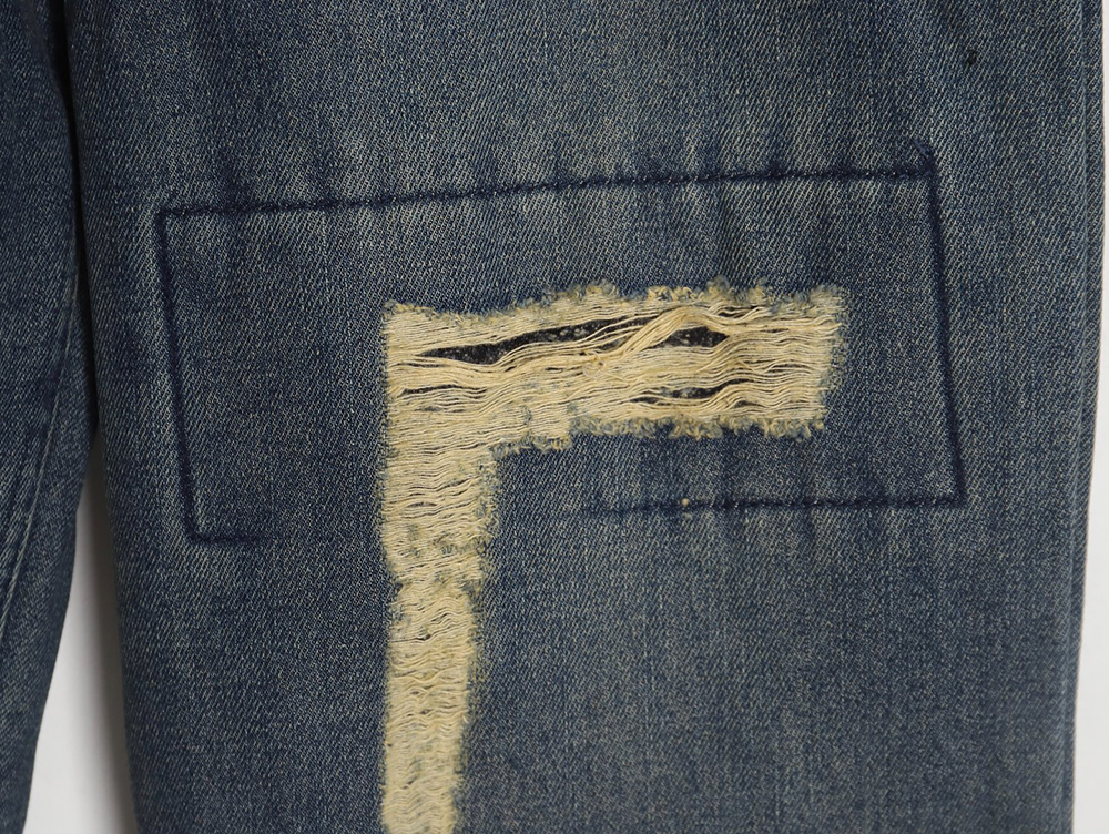 Balenciaga Double B embossed lightning wash distressed jeans
