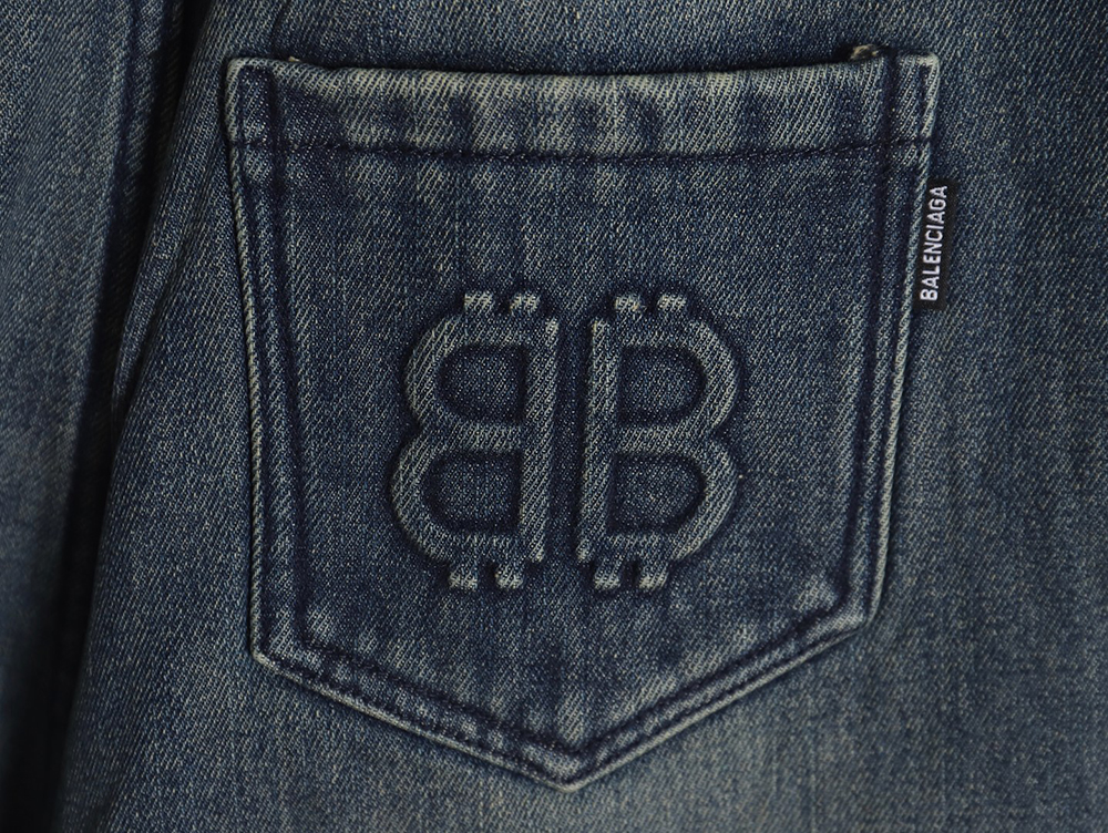 Balenciaga Double B embossed lightning wash distressed jeans