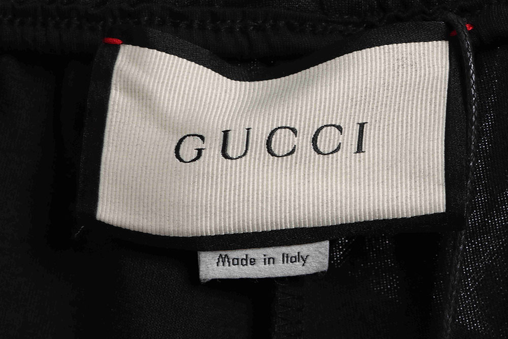 Gucci reflective webbing suit trousers