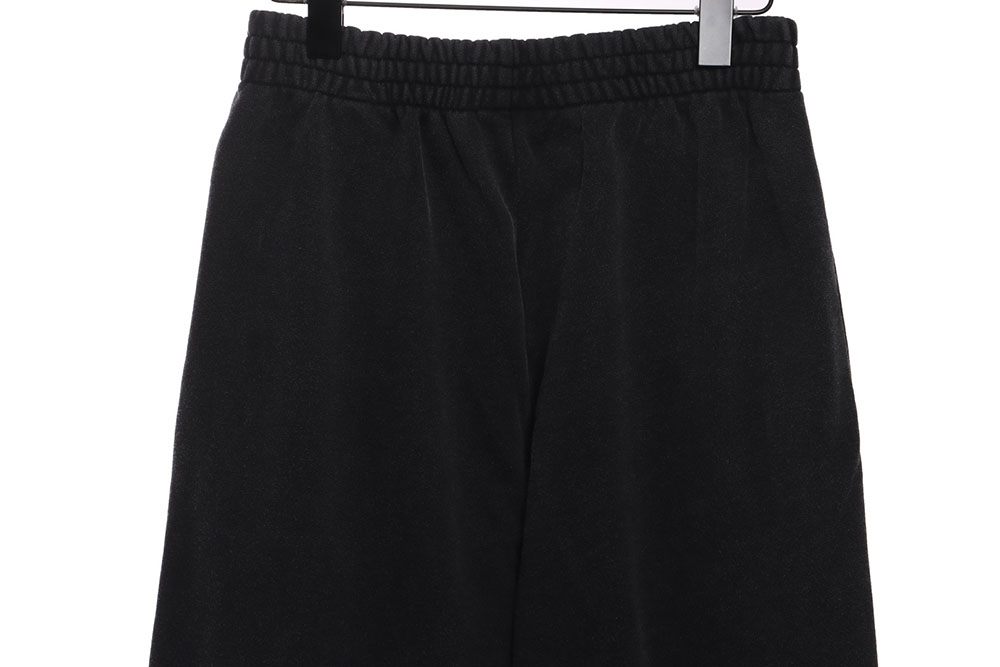 Balenciaga distressed washed monogram trousers