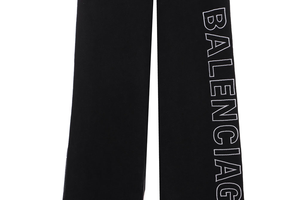 Balenciaga distressed washed monogram trousers