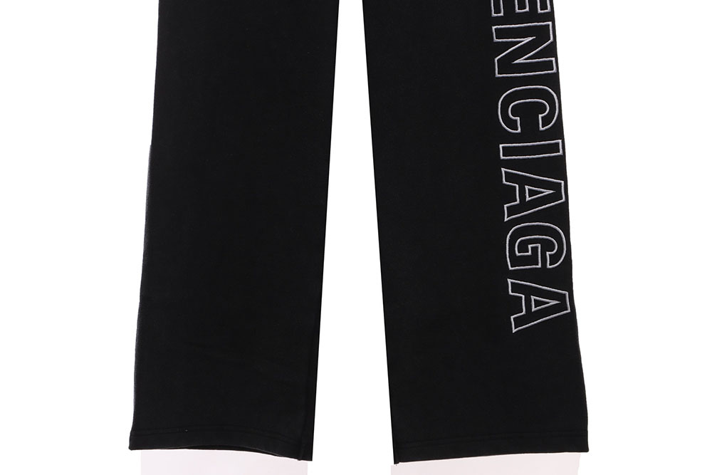 Balenciaga distressed washed monogram trousers
