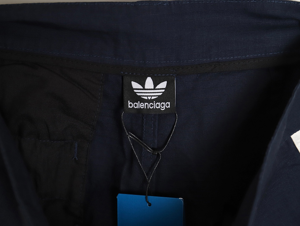 Balenciaga & Adidas embroidered three-bar navy cargo shorts