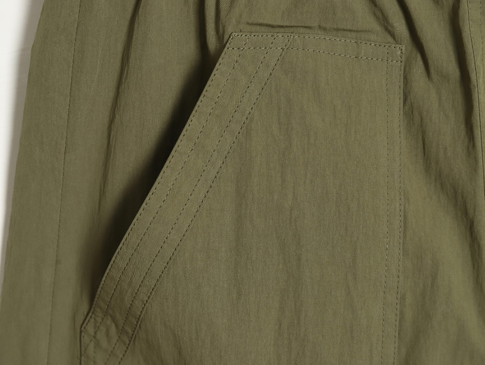 Loewe Olive Green Cotton Blend Shorts with Embroidered Pockets