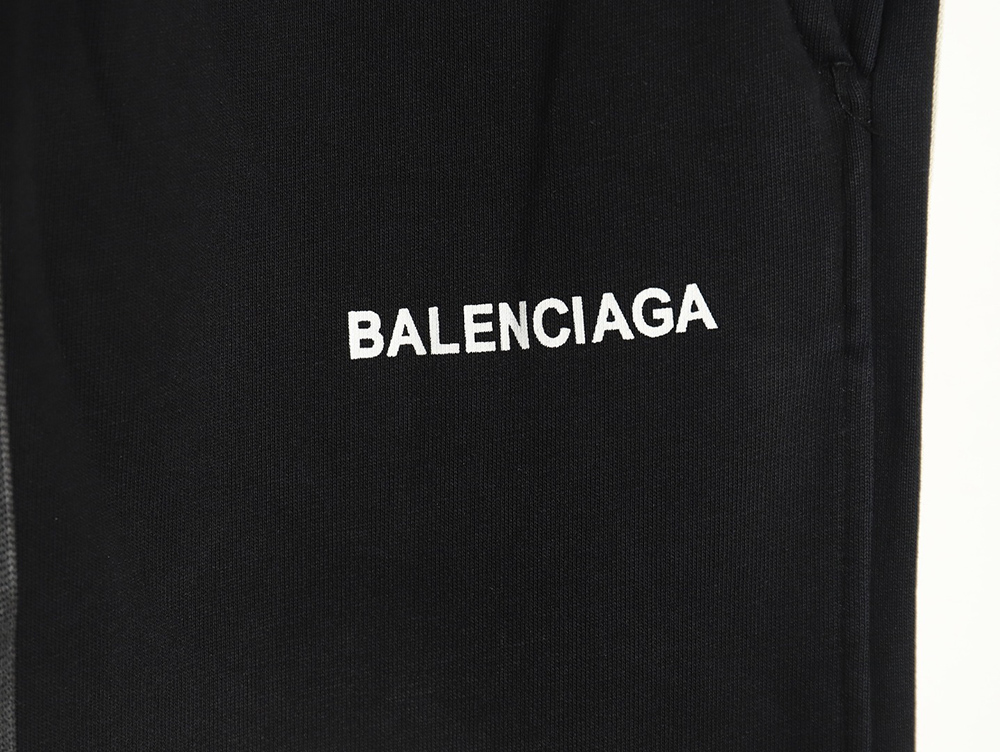 Balenciaga washed letter print web trousers