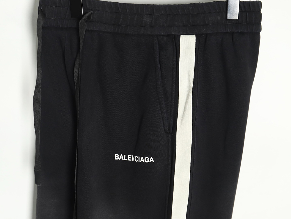 Balenciaga washed letter print web trousers