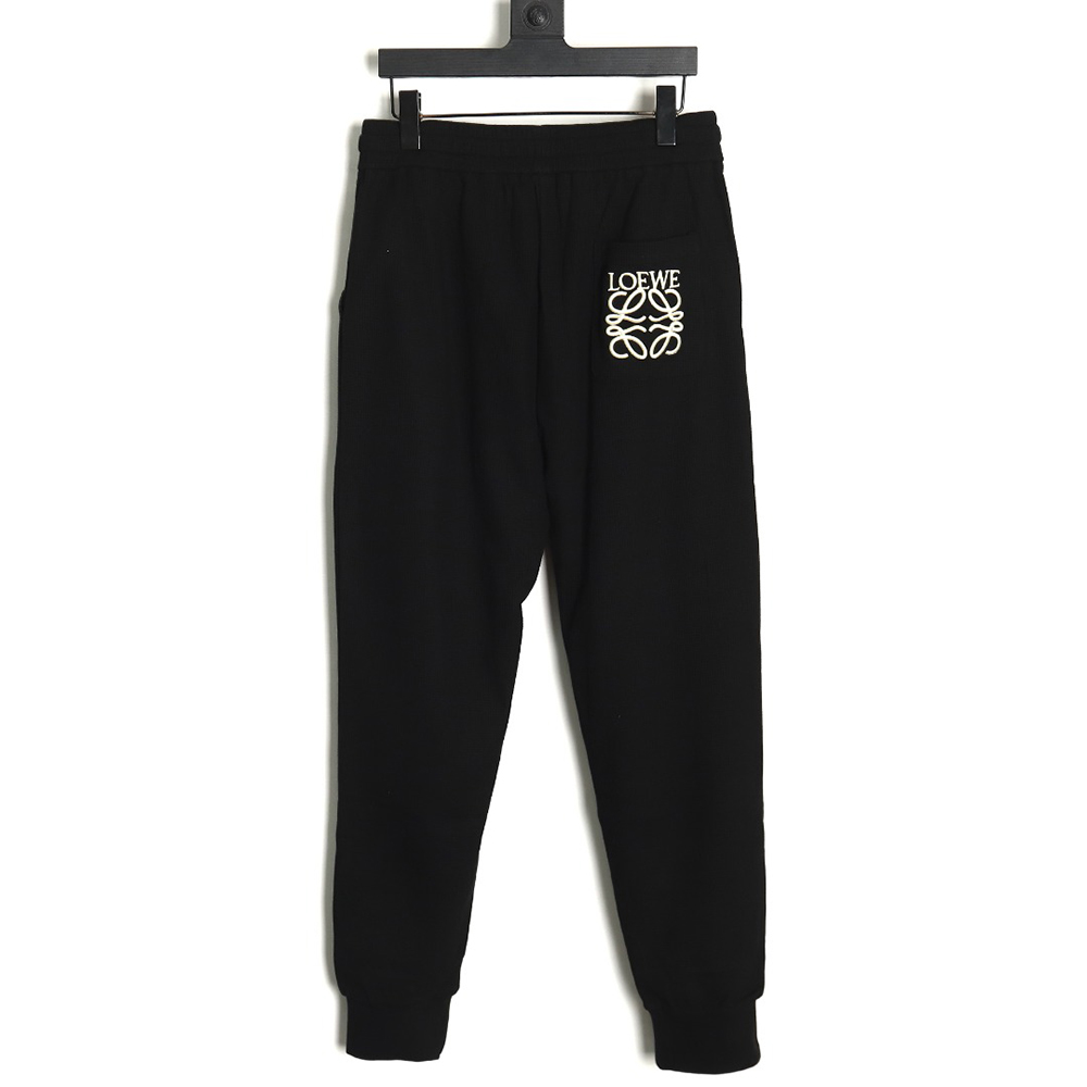 Loewe embroidered logo waffle trousers TSK1