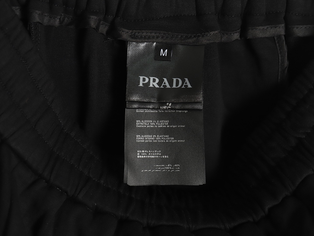 Prada triangle logo iron plate cotton cargo trousers