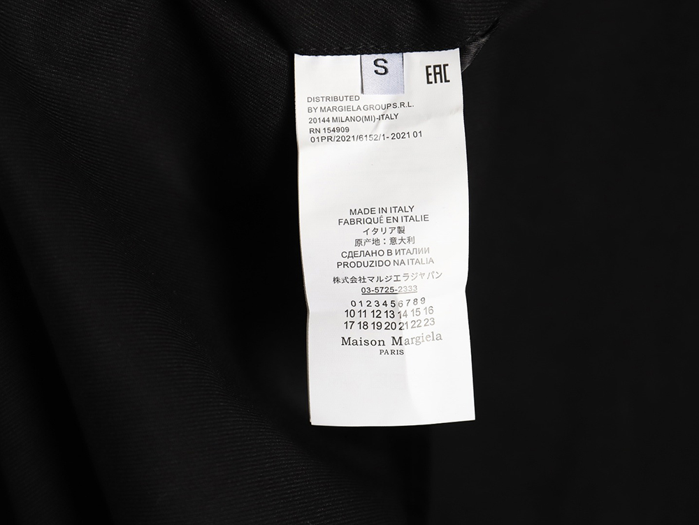 Maison Margiela collarless suit