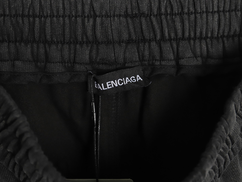 Balenciaga washed casual trousers with small logo on the leg