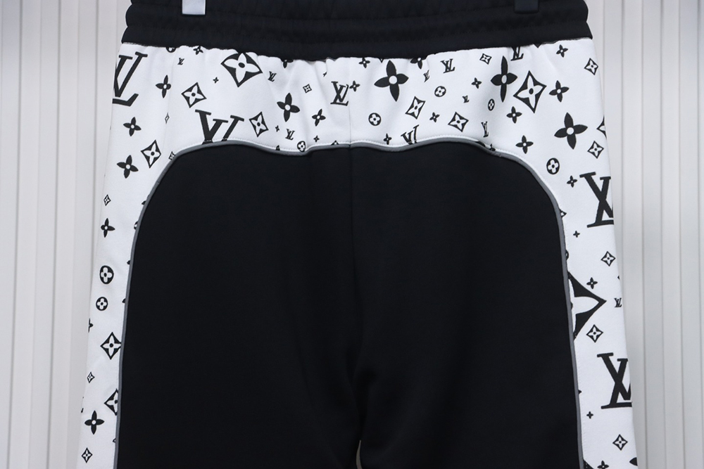 Louis Vuitton logo pocket zip-up trousers