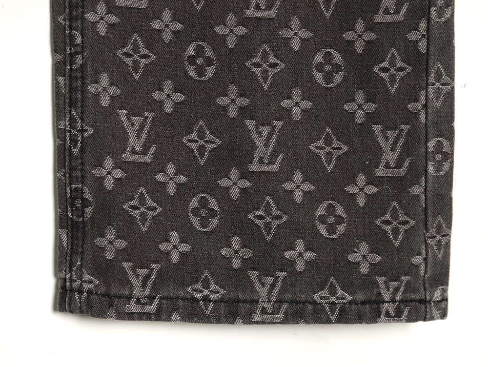 Louis Vuitton printed distressed denim trousers