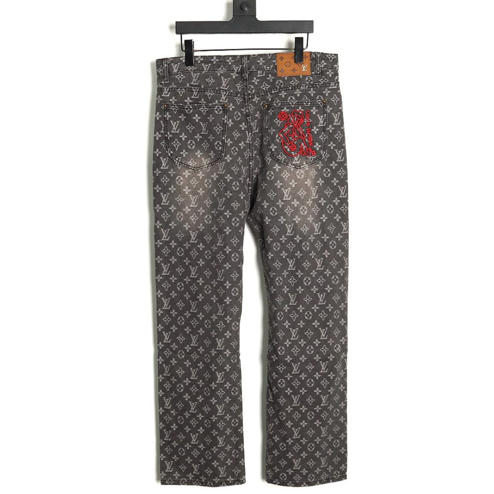 Louis Vuitton printed distressed denim trousers