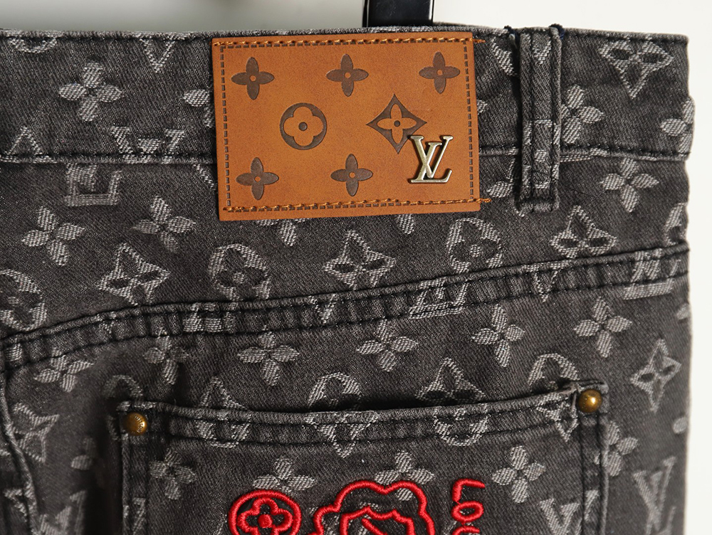 Louis Vuitton printed distressed denim trousers