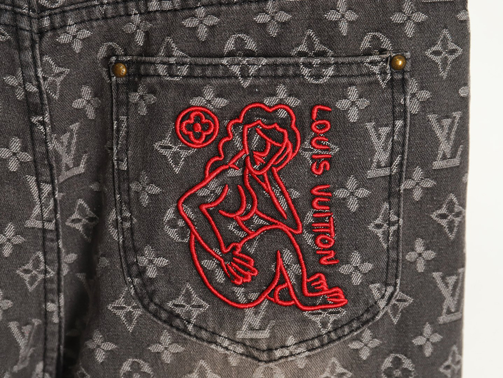 Louis Vuitton printed distressed denim trousers