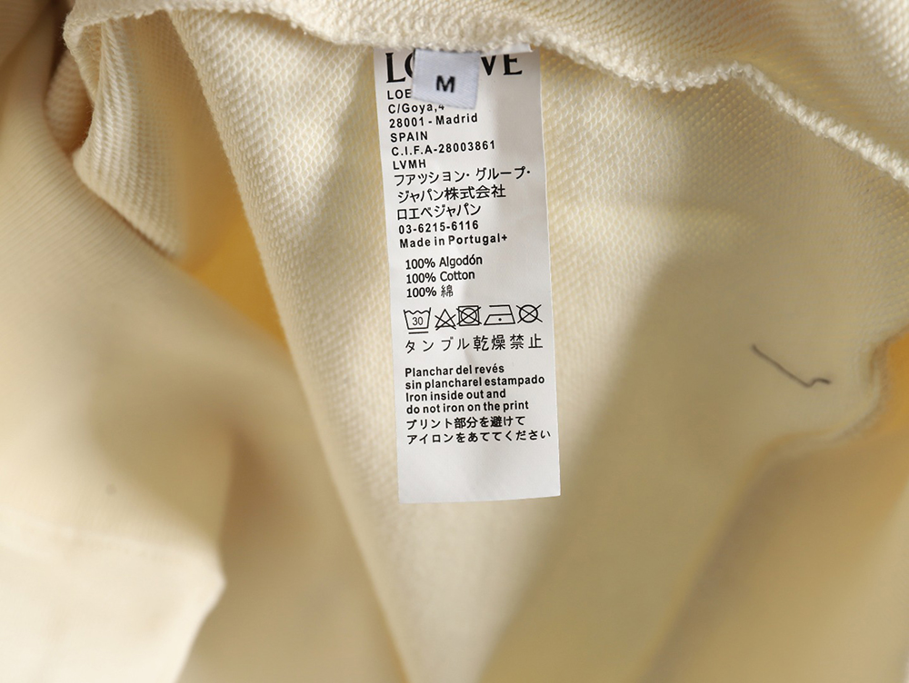 Loewe hooded sweatshirt with embossed logo on chest and leather pockets