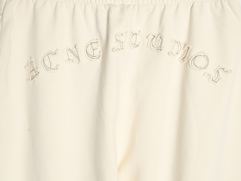 Acne Studios embroidered logo lettering relaxed straight-leg track pants