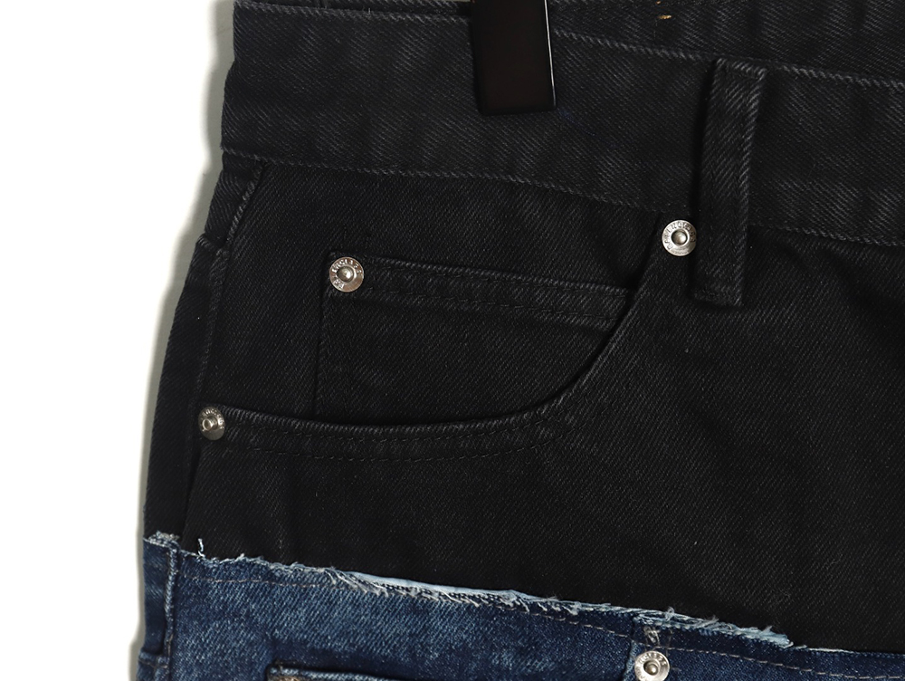 Balenciaga black and blue patchwork ripped denim trousers