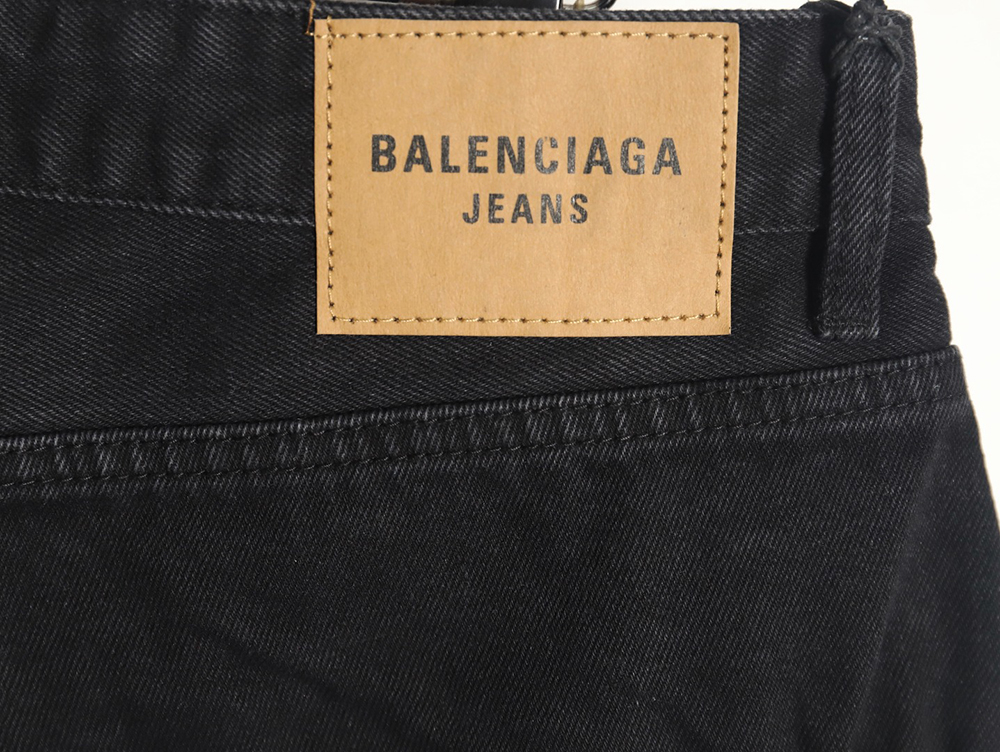 Balenciaga black and blue patchwork ripped denim trousers