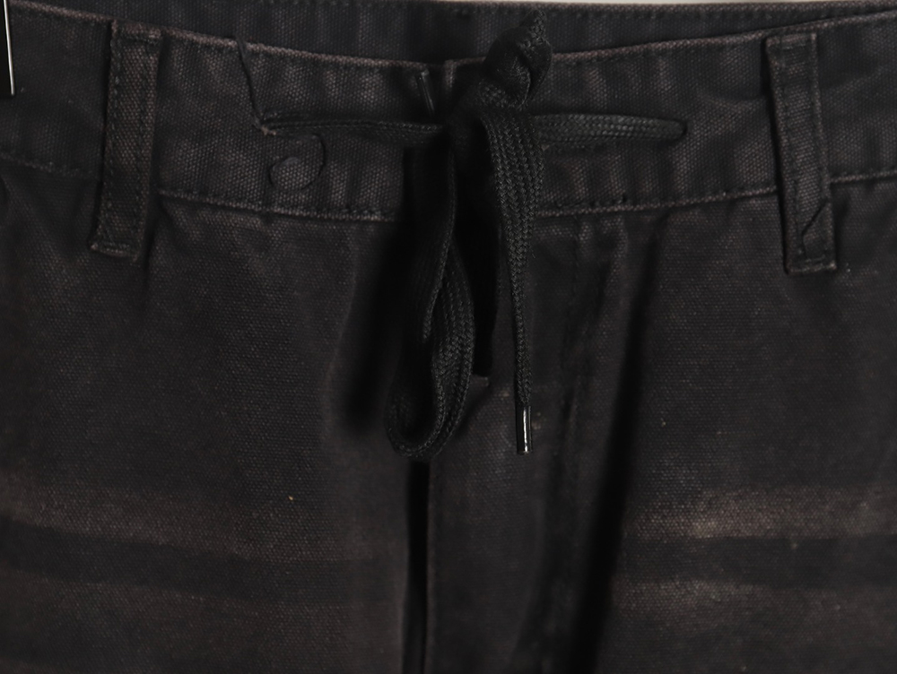Balenciaga distressed denim trousers with ripped pockets