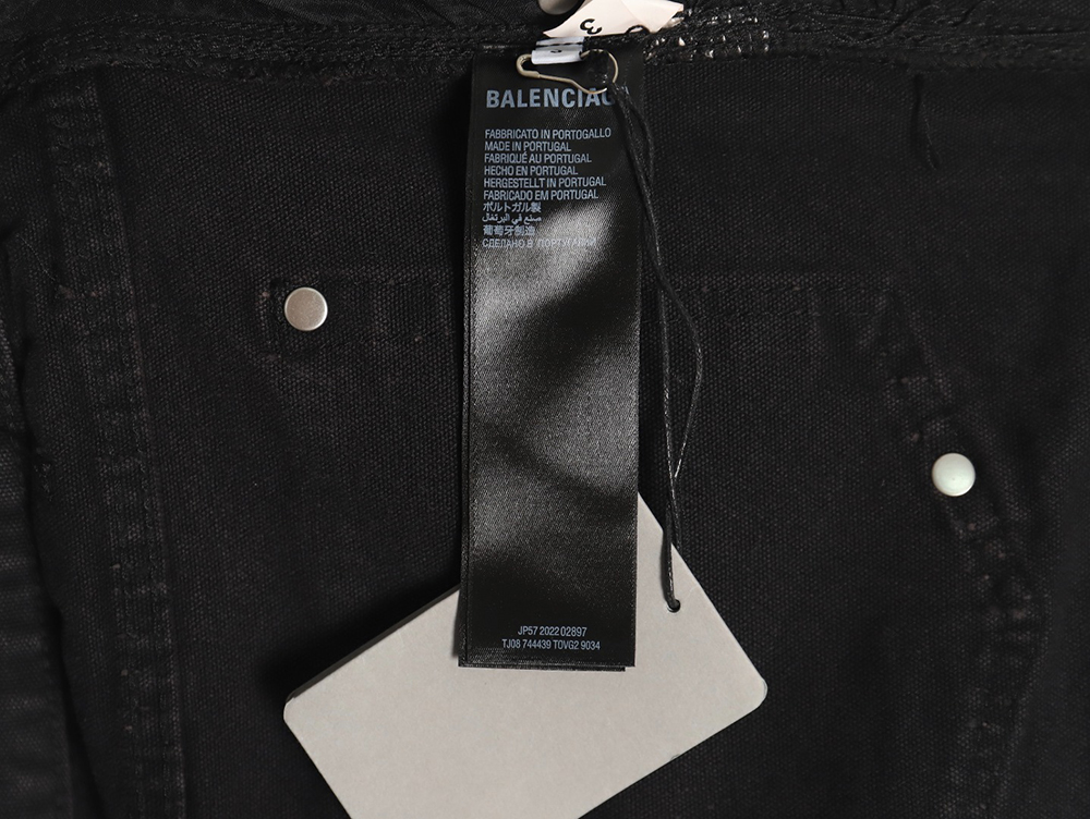 Balenciaga distressed denim trousers with ripped pockets