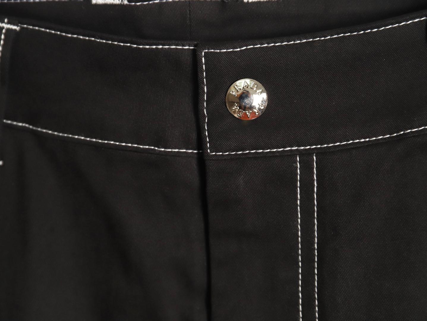 Prada triangle logo white line denim trousers