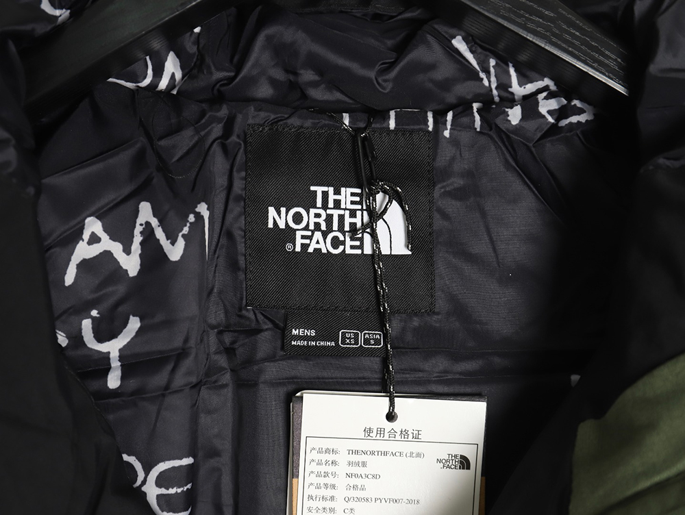 The North Face colorblock print zip-up hooded down jacket