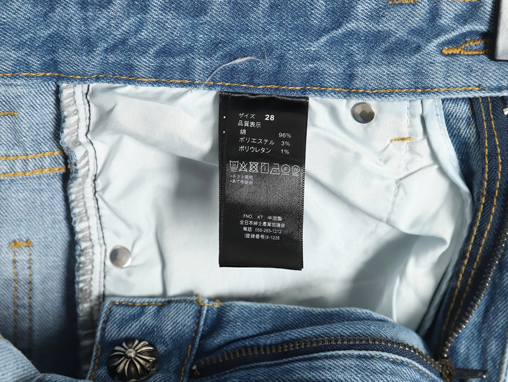 Chrome Hearts washed blue jeans
