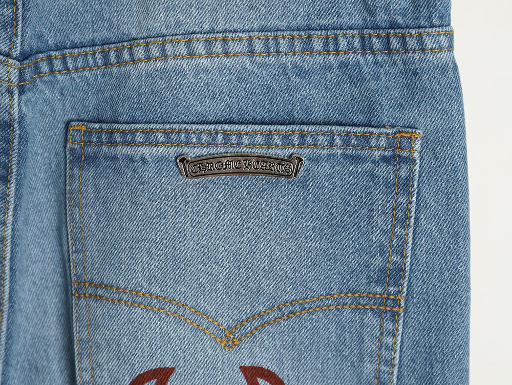 Chrome Hearts washed blue jeans