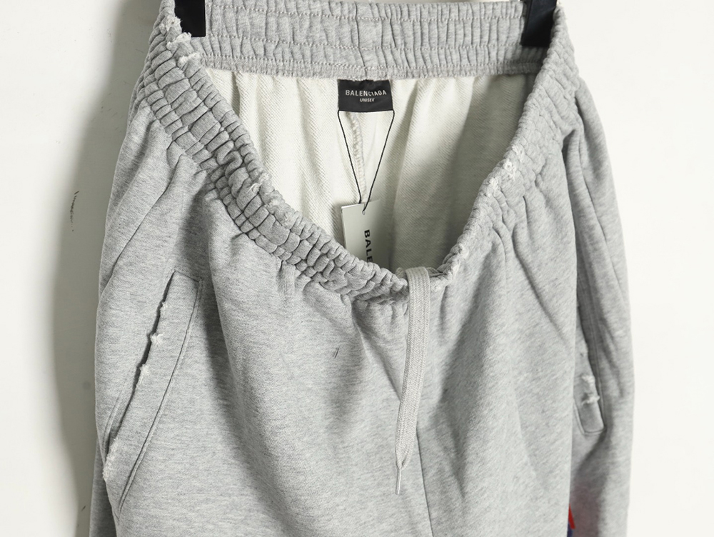 Balenciaga Earth pattern print distressed trousers