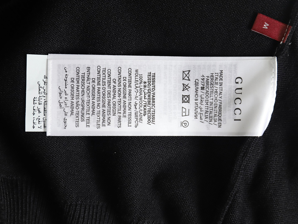 Gucci sequin logo sweater
