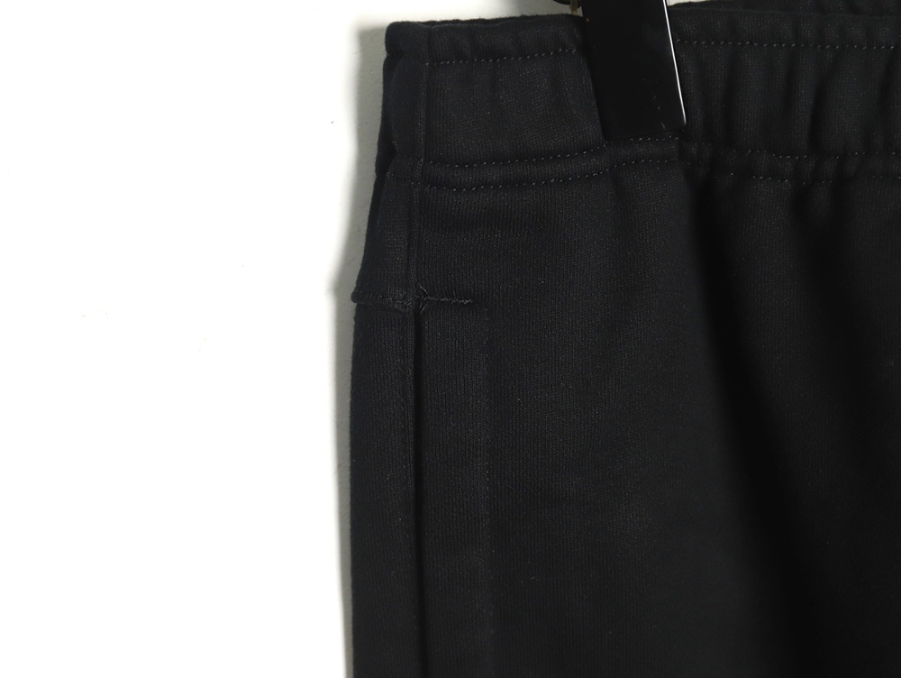 Maison Margiela digital logo print trousers