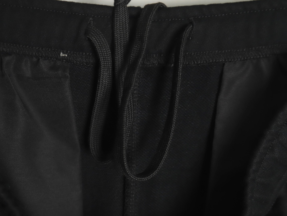 Maison Margiela digital logo print trousers