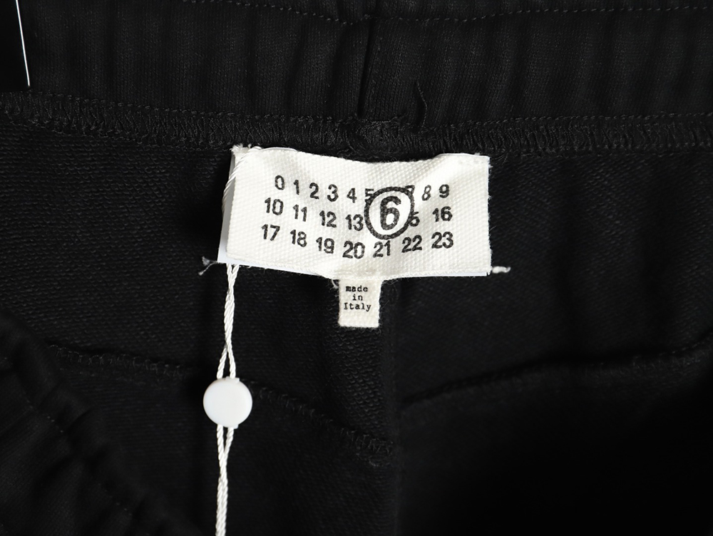 Maison Margiela digital logo print trousers