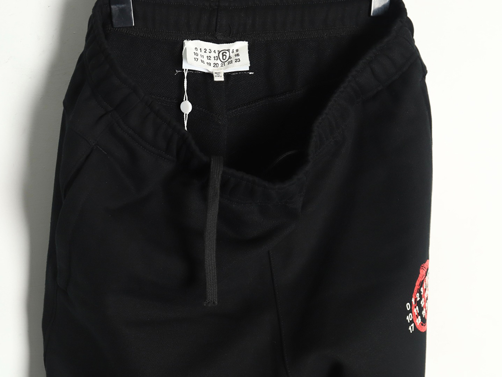 Maison Margiela digital logo print trousers