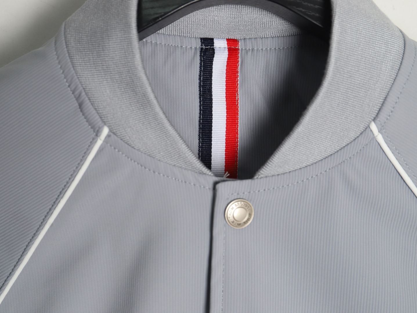 Thom Browne four-bar bomber jacket
