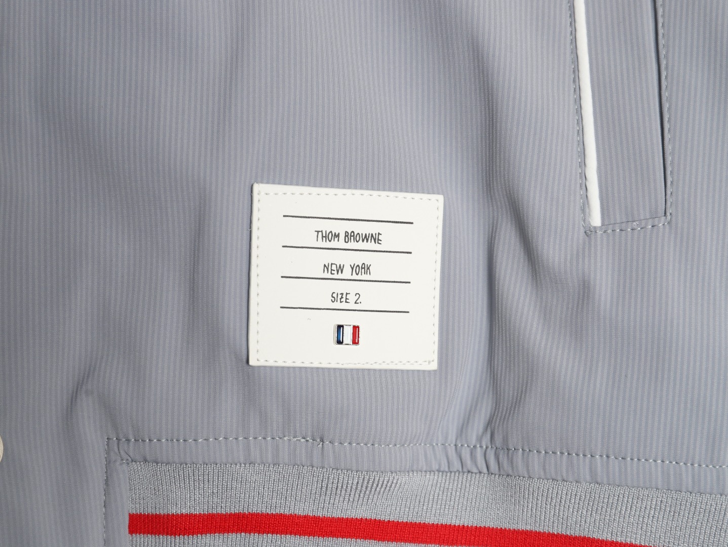 Thom Browne four-bar bomber jacket