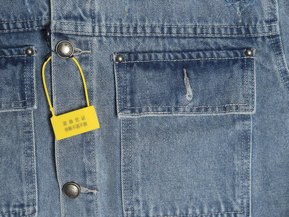 Louis Vuitton laser-positioned LoGo distressed denim jacket
