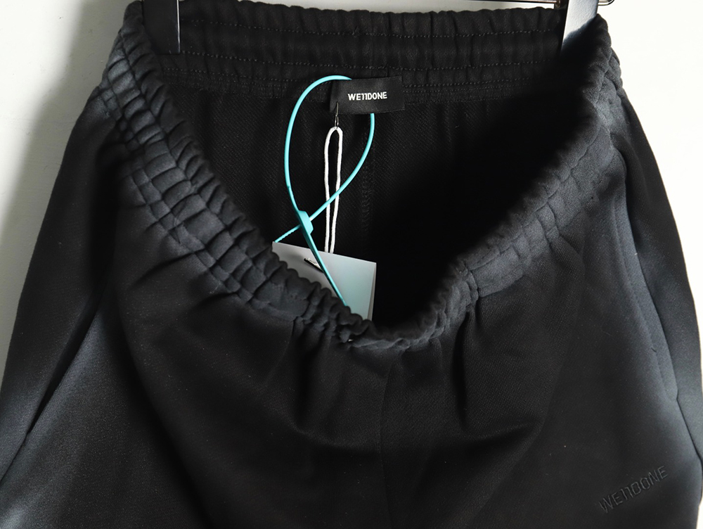 We11 Done colorful spray-trimmed washed wide-leg pants