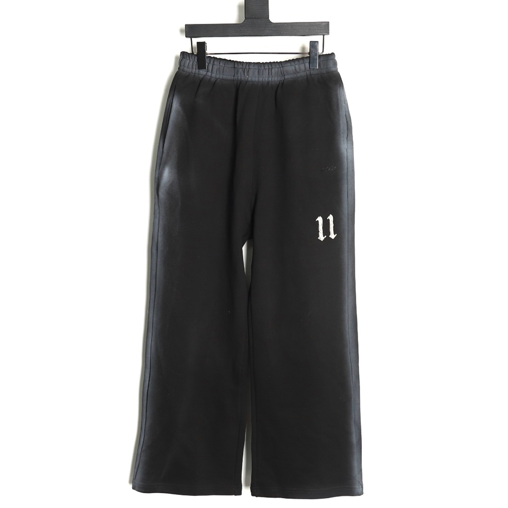 We11 Done colorful spray-trimmed washed wide-leg pants