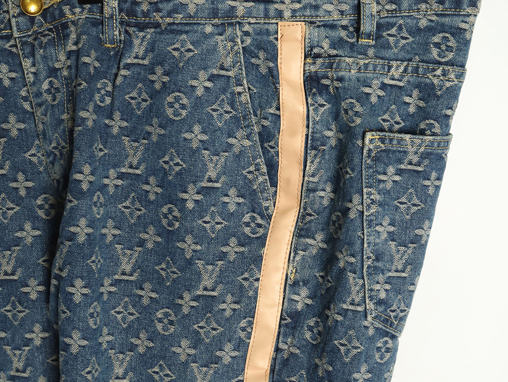 Louis Vuitton washed blue jeans with all-over print and side straps