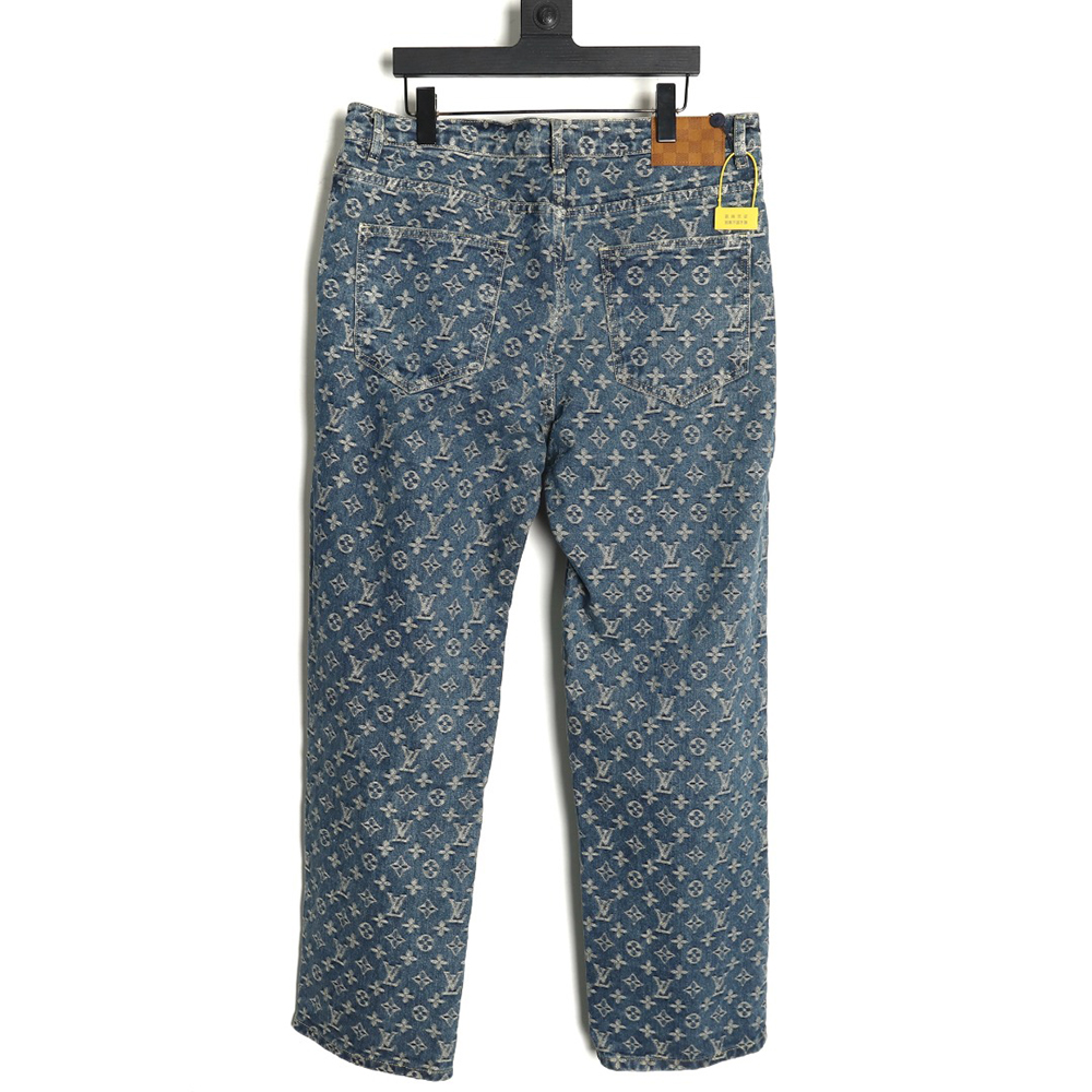 Louis Vuitton washed blue jeans with all-over print and side straps