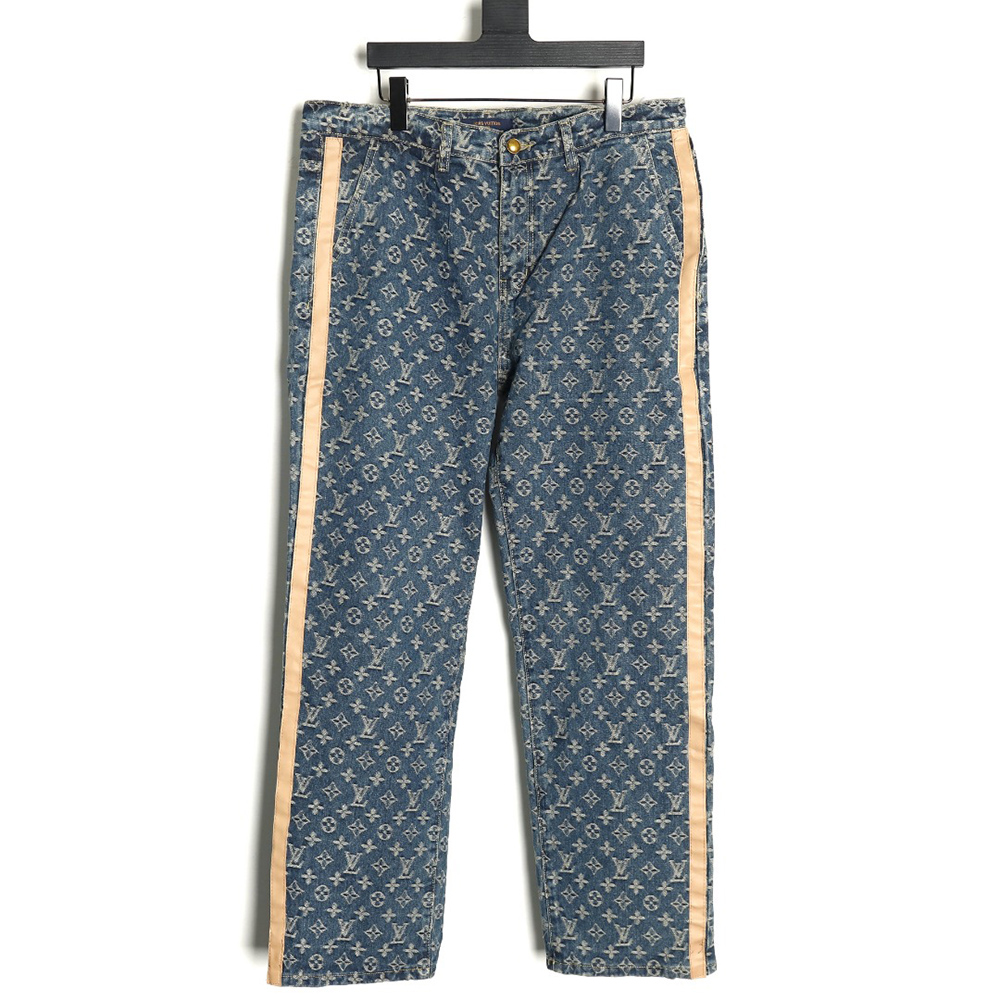 Louis Vuitton washed blue jeans with all-over print and side straps
