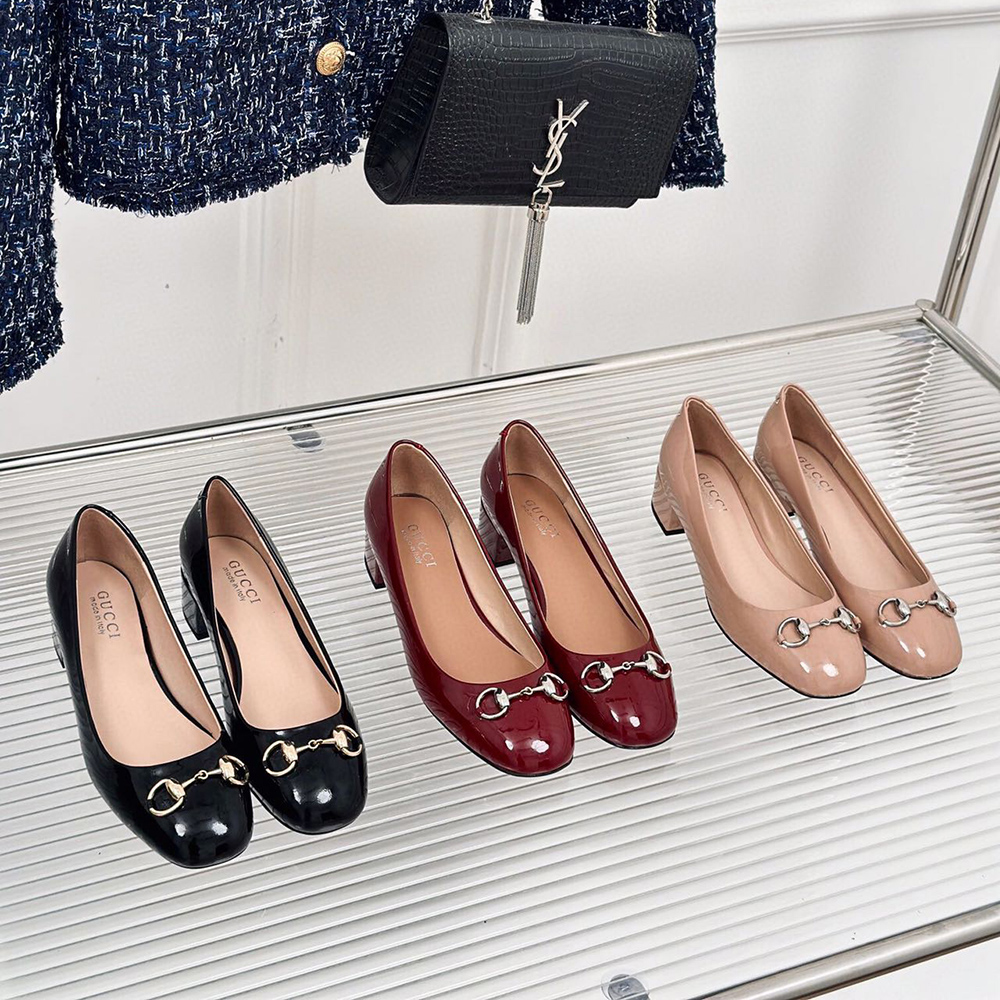 Gucci Horsebit black patent leather low heels
